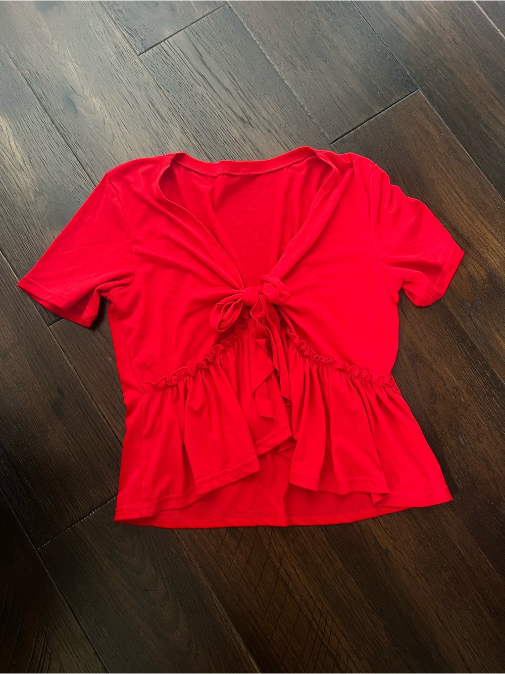 Ruffle hem tie front top